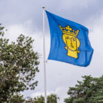 Flagga med Stockholms stads logga. Foto: Mostphotos